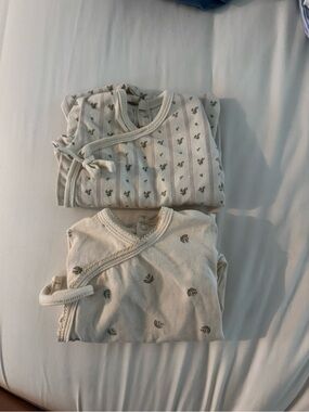 Neutral Cream Baby Footie One-Piece with Subtle Floral Print